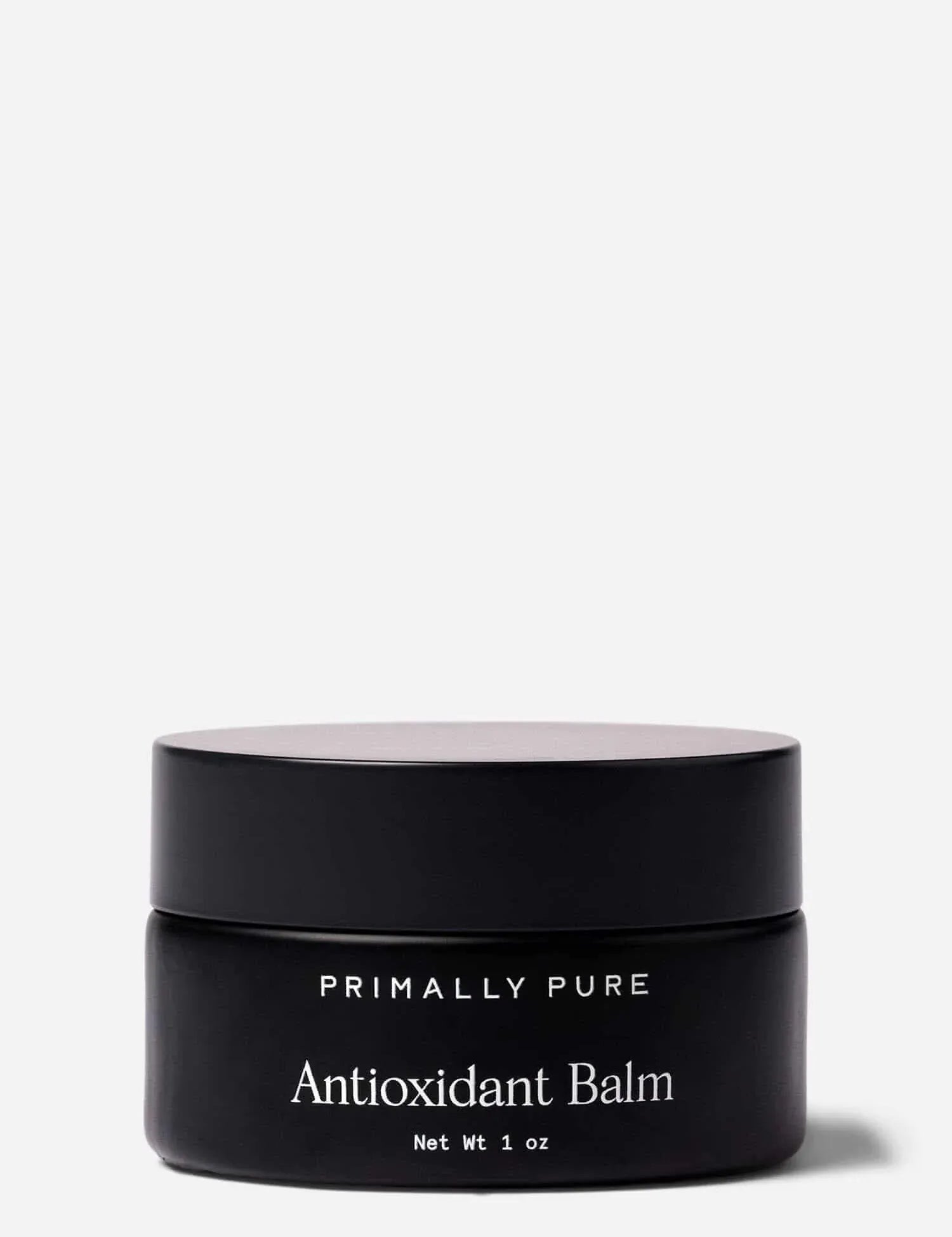 Black jar of Primally Pure Antioxidant Balm on a white background