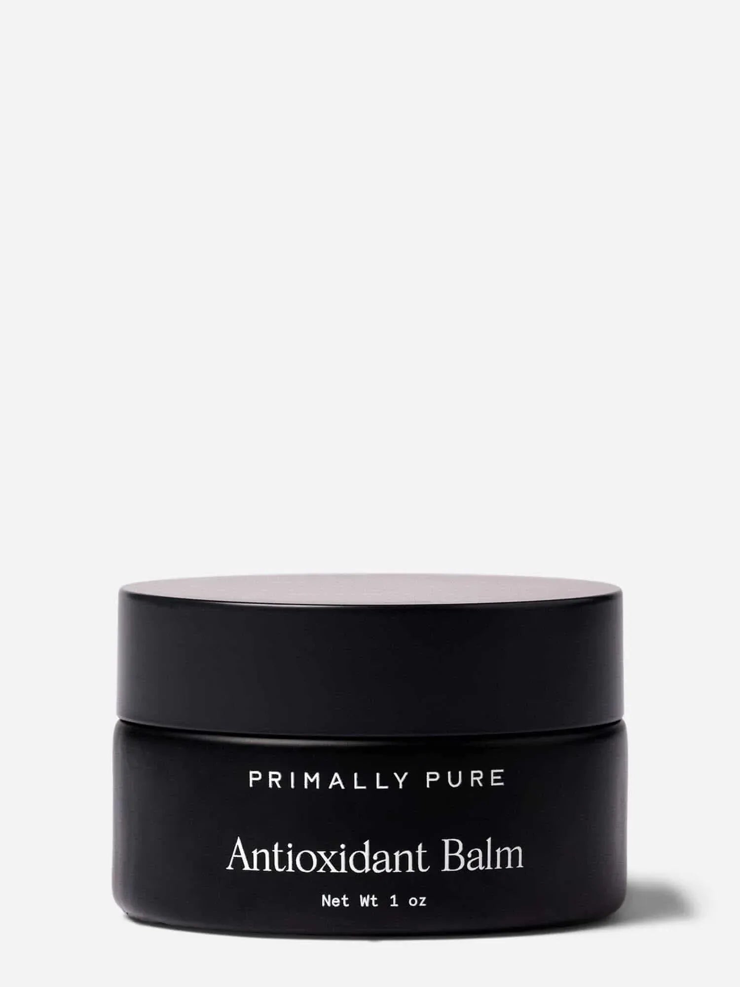 Black jar of Primally Pure Antioxidant Balm on a white background