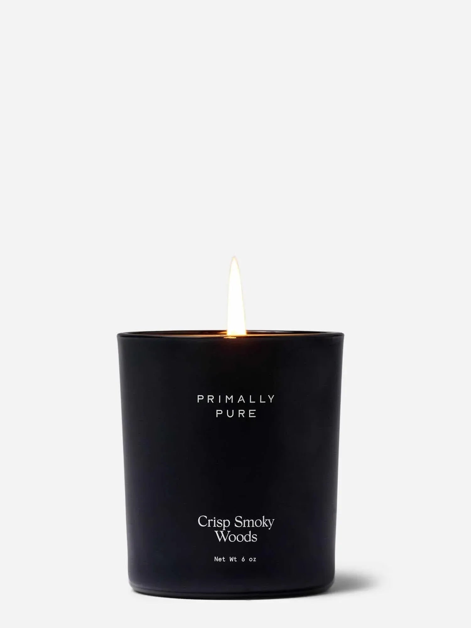 Primally Pure Crisp Smoky Woods Candle on a white background