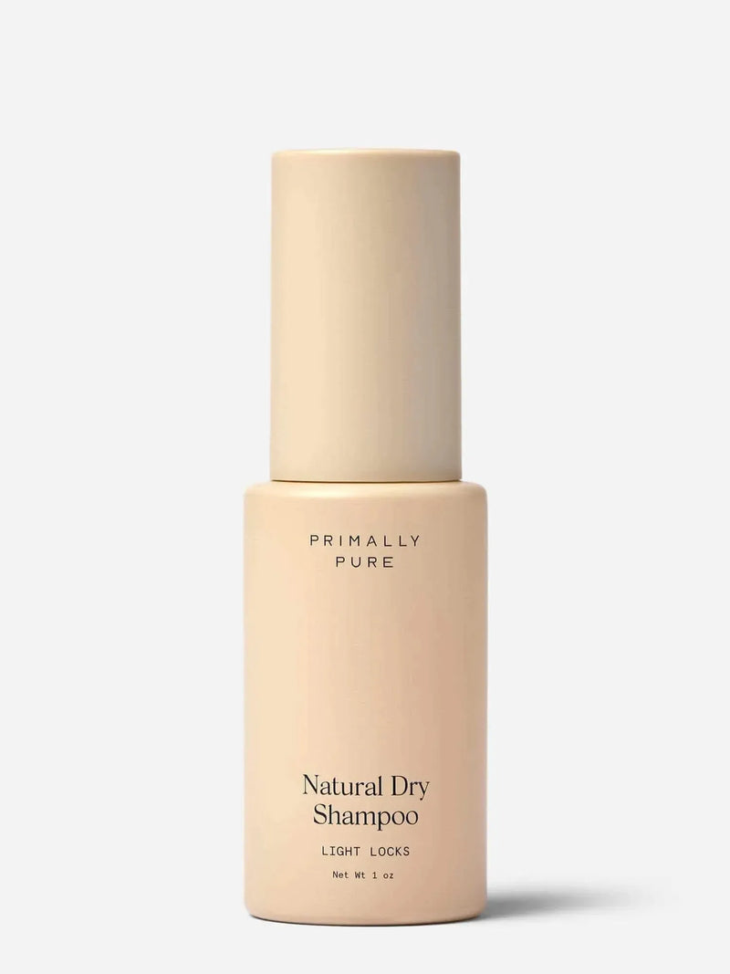 Beige bottle of Primally Pure Natural Dry Shampoo for light hair (Light Locks) on a white background
