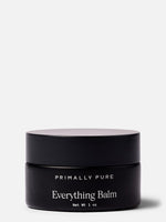 Black jar of Primally Pure Everything Balm, a tallow balm product, on a white background.