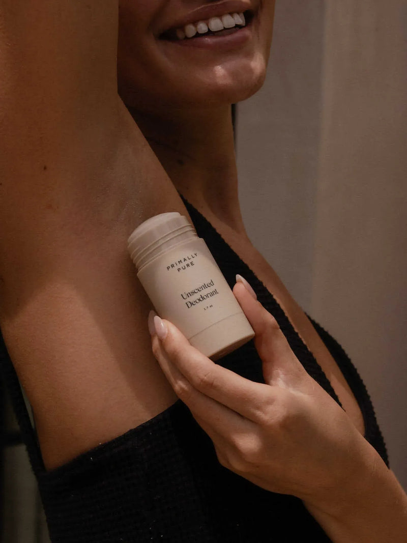 Woman applying Unscented Deodorant Deodorant Primally Pure - Best all natural deodorant