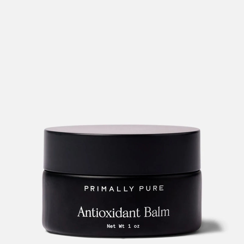 Black jar of Primally Pure Antioxidant Balm on a white background