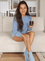 Primally Pure Blue Tansy Body Butter being applied on a woman's leg