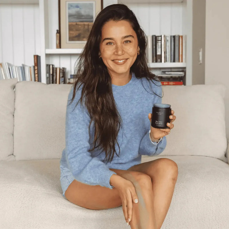 Primally Pure Blue Tansy Body Butter being applied on a woman's leg