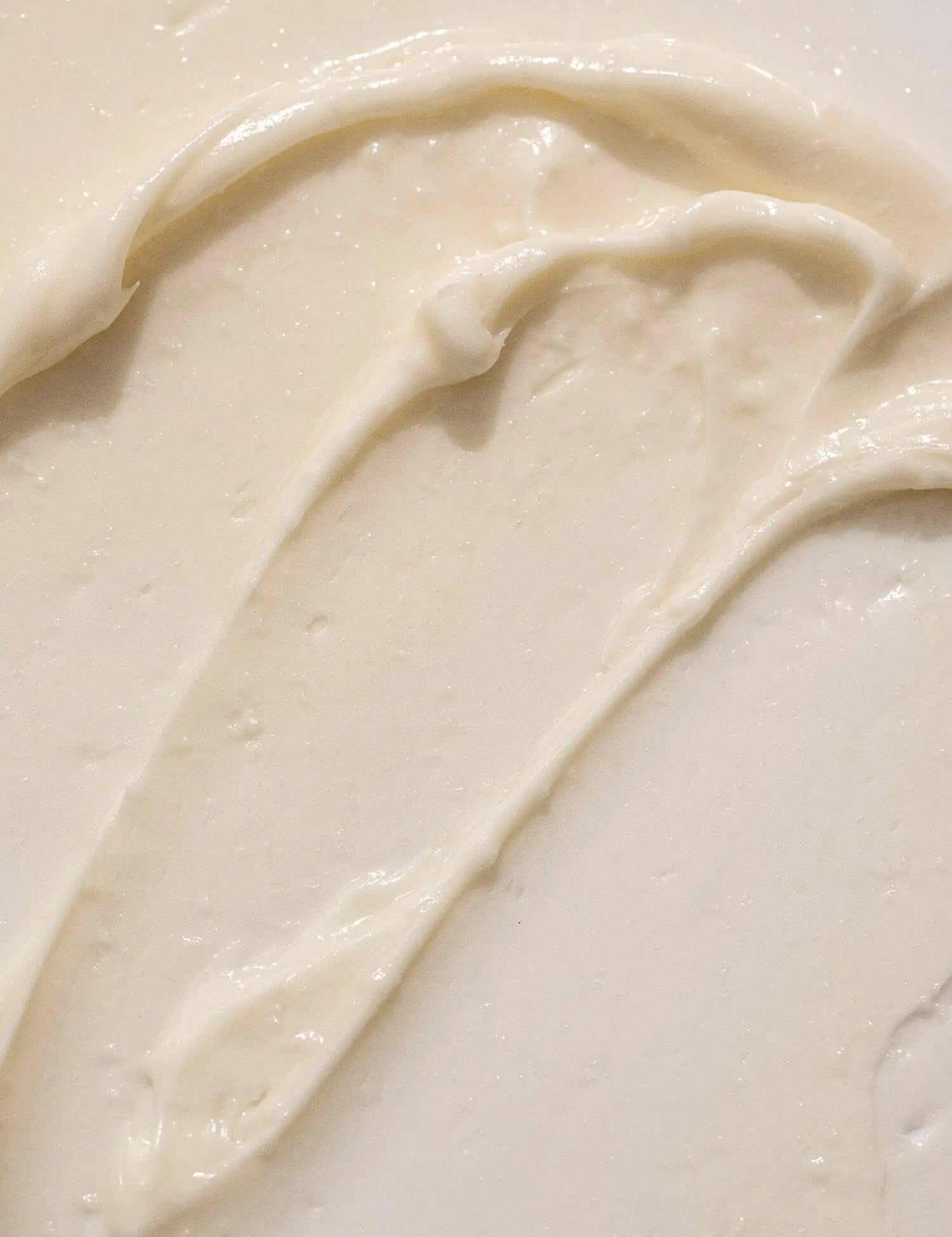 Close-up of smooth, creamy Citrus + Mint Body Butter texture