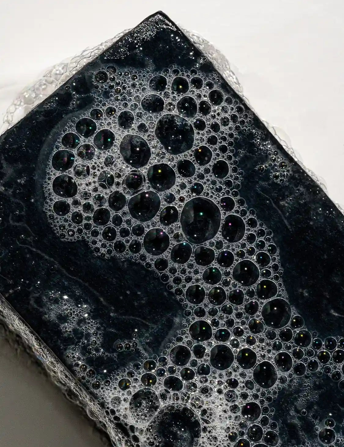 Close up of soapy Clarifying Bar Primally Pure - Non-toxic skincare