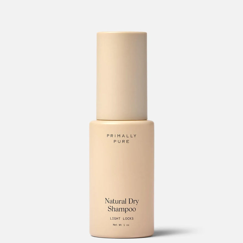 Beige bottle of Primally Pure Natural Dry Shampoo for light hair (Light Locks) on a white background