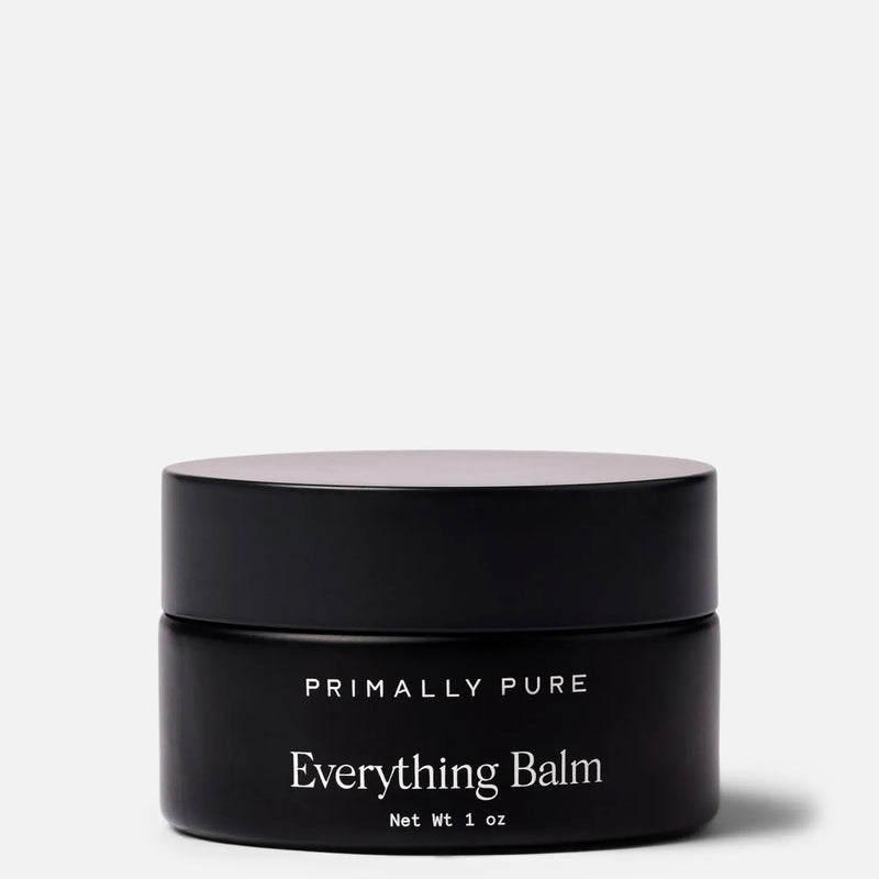 Black jar of Primally Pure Everything Balm, a tallow balm product, on a white background.