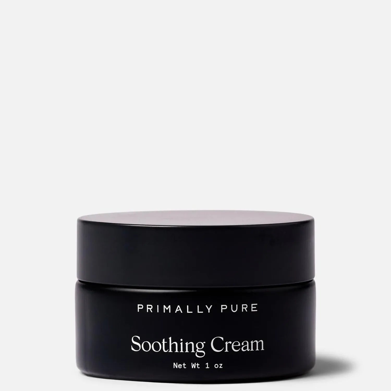Black jar of Primally Pure Soothing Cream on a white background