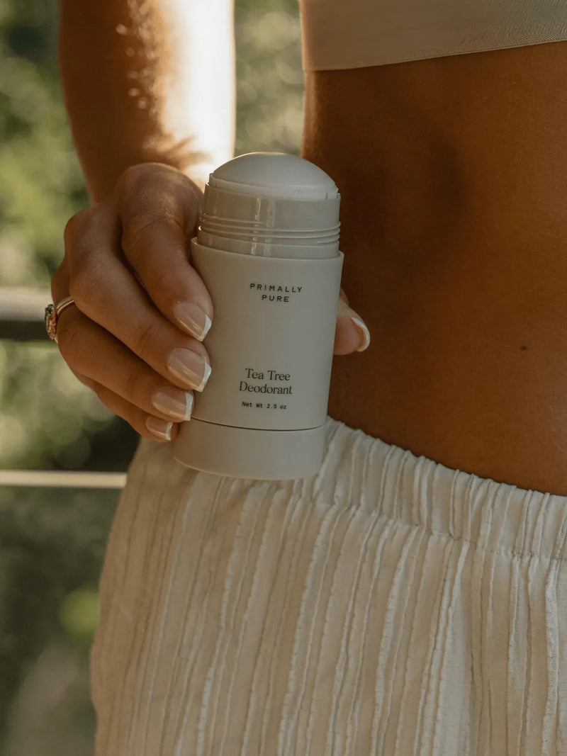 Woman holding Tea Tree Deodorant Deodorant Primally Pure - Natural deodorant - 40,000 5-star reviews