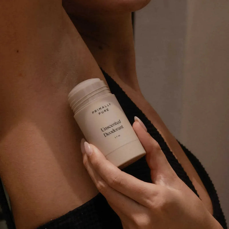 Woman applying Unscented Deodorant Deodorant Primally Pure - Best all natural deodorant