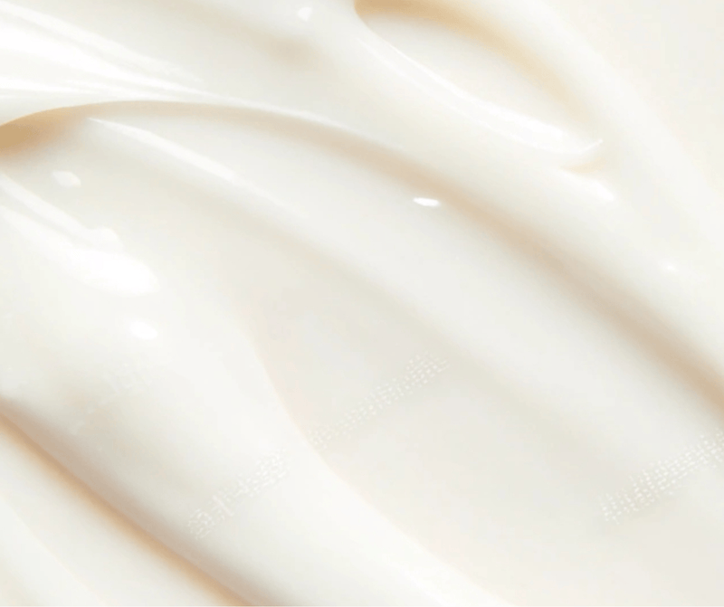 Smooth white zinc oxide cream used as a natural sunscreen ingredient.